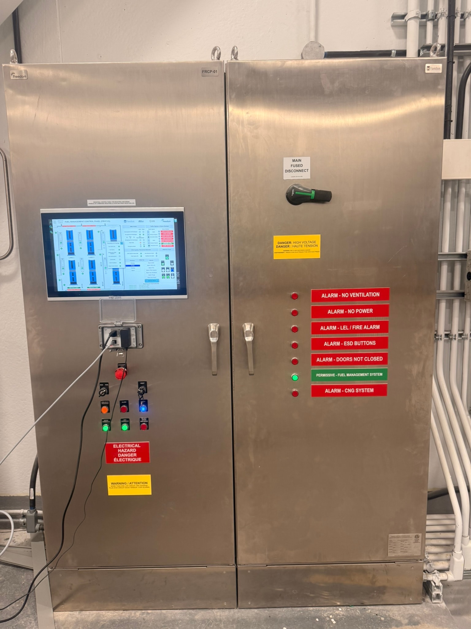 Completed fueling room control panel — stainless steel enclosure with HMI and alarm indicators